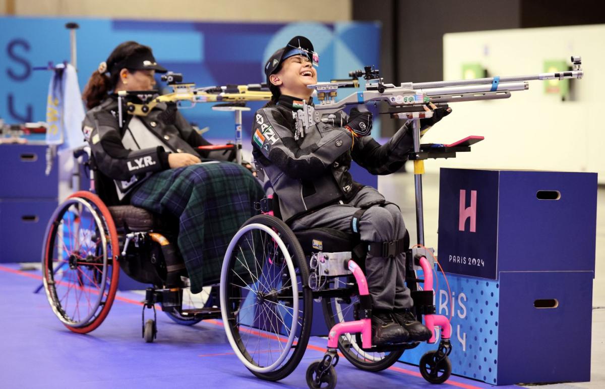 Two female athletes competing in shooting Para sport at the Paris 2024 Paralympics