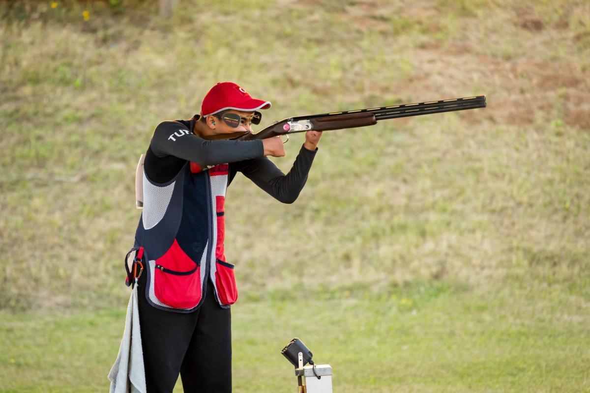 A male Para trap shooter in a competition
