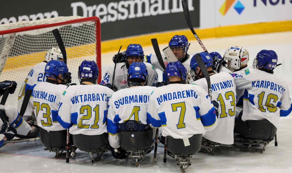 Players gather before the start of the match