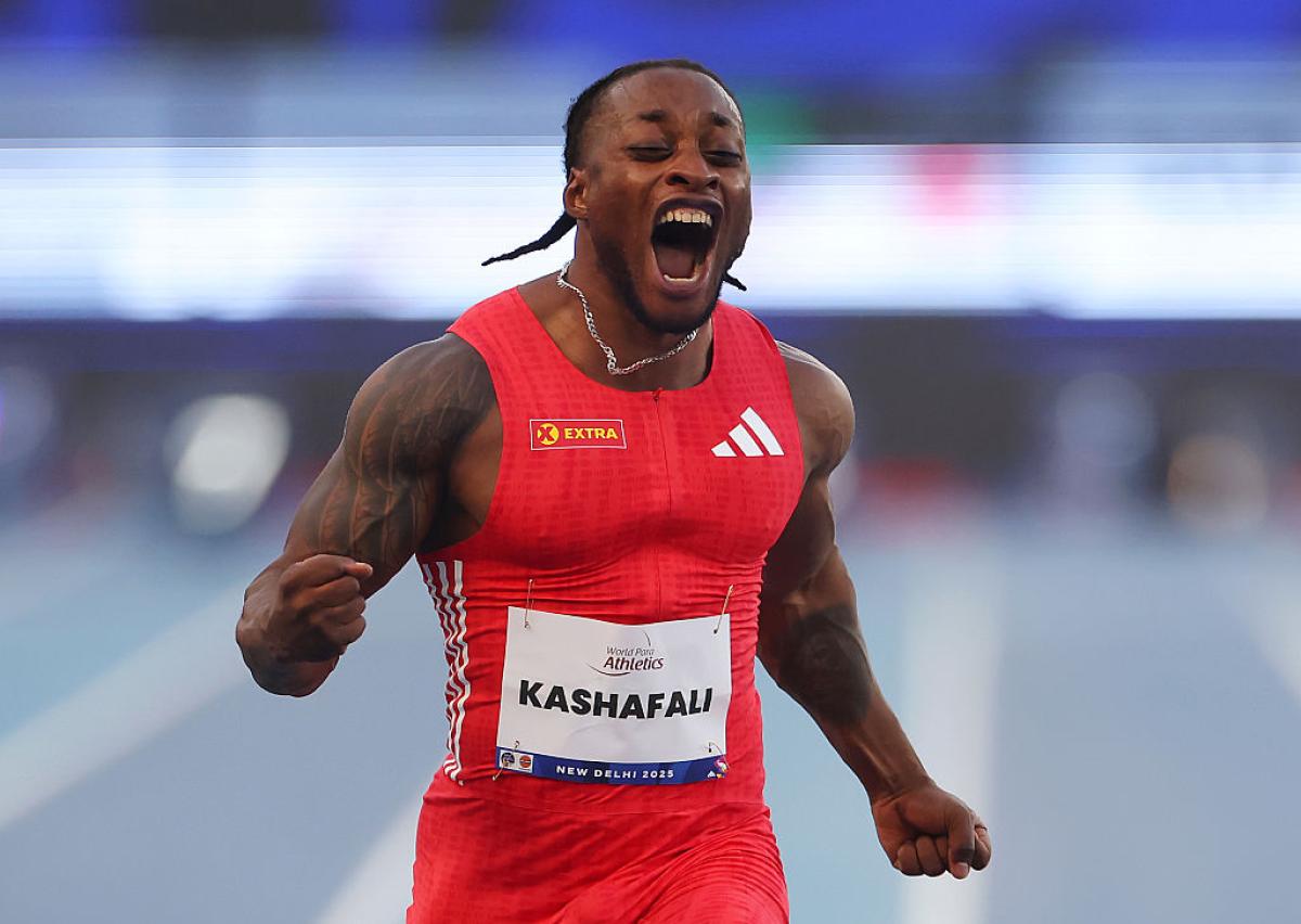 An athlete celebrates in joy