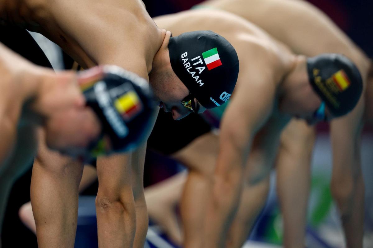 Swimmers at the start line-up