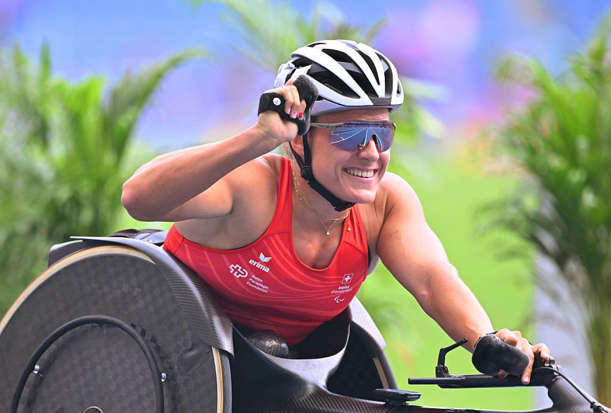 An athlete celebrates in joy