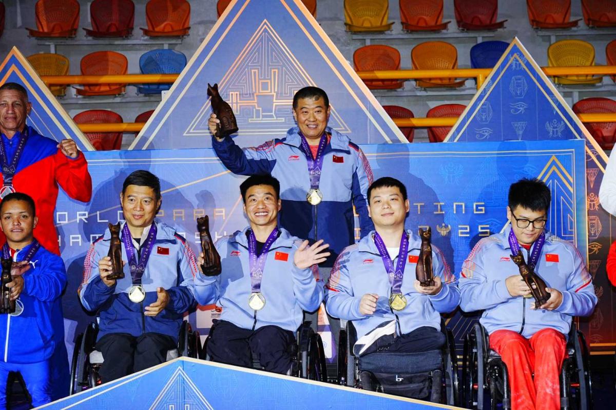 Athletes celebrate on podium