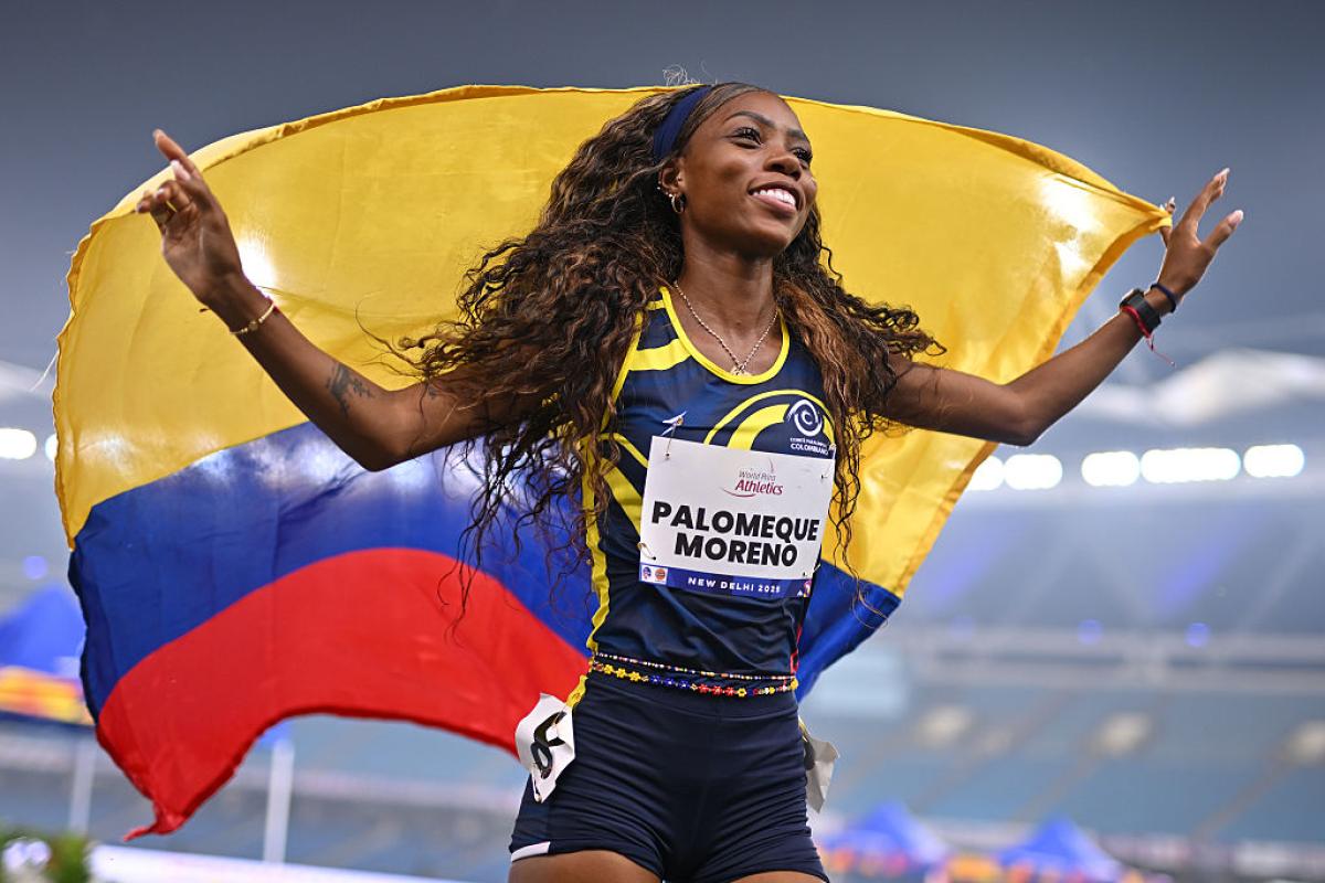 An athlete celebrates in joy