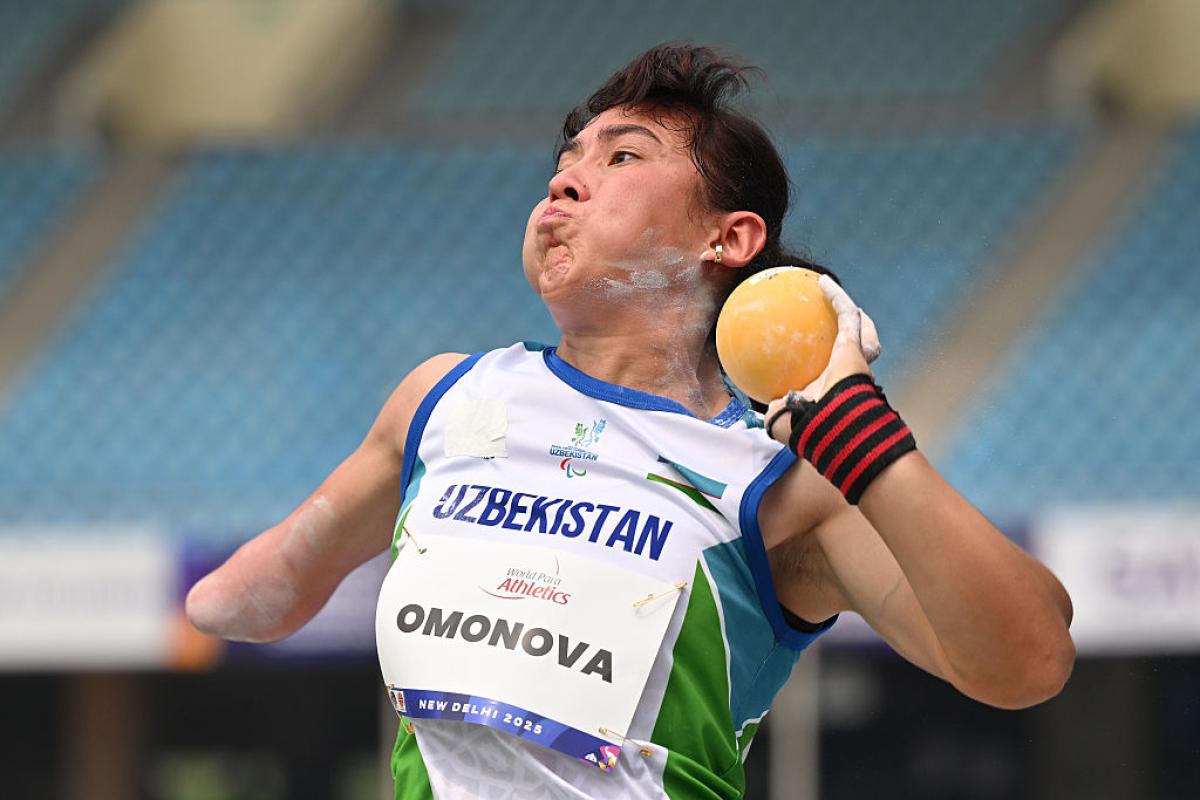 A shot putter in action 