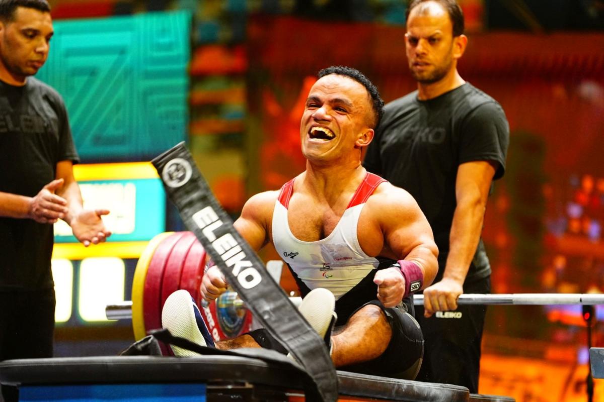 An athlete celebrates in joy