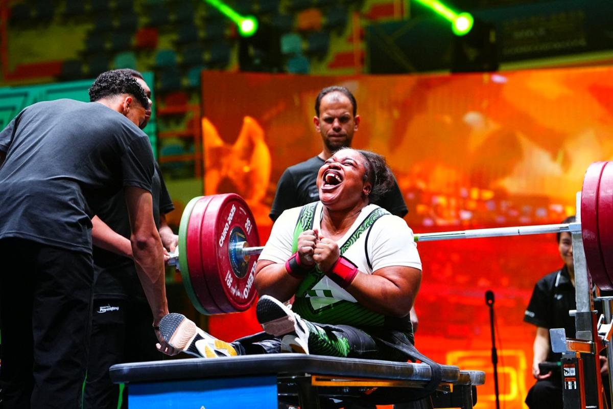An athlete celebrates in joy