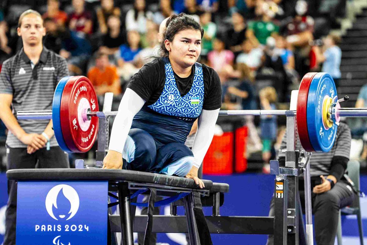 An athlete reacts after a lift 