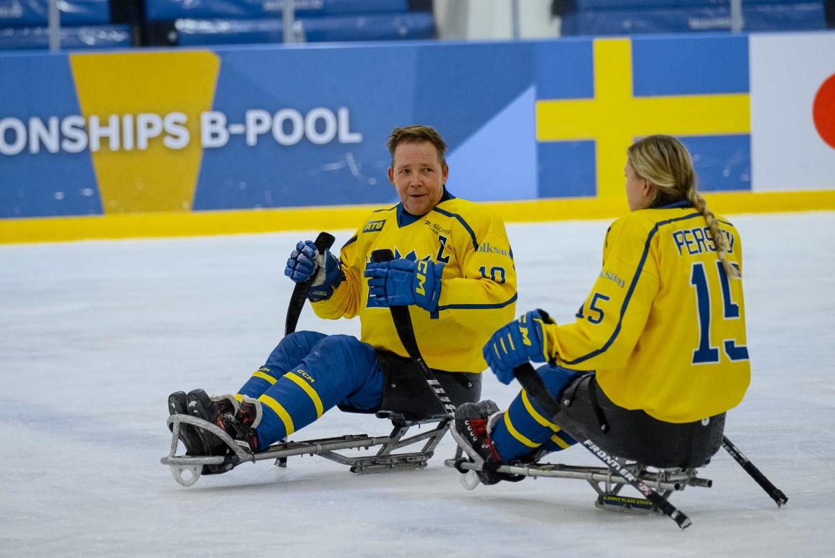 Para Ice hockey athletes in action