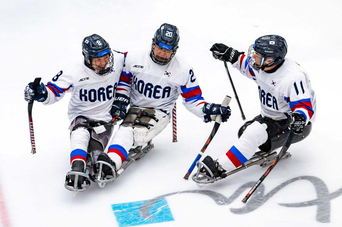 Athletes celebrate in joy