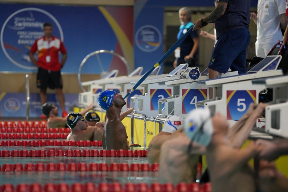 An athlete gets ready for his swim