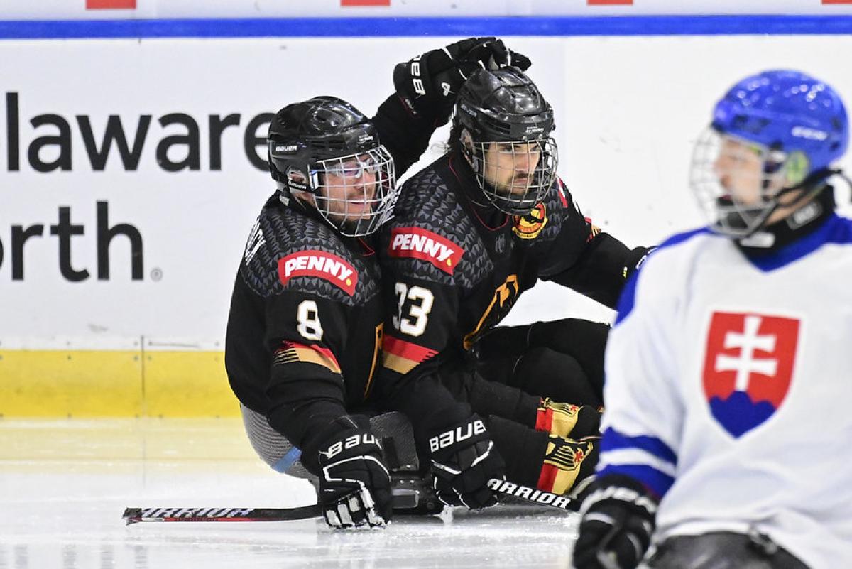 Two German Para ice hockey players celebrating