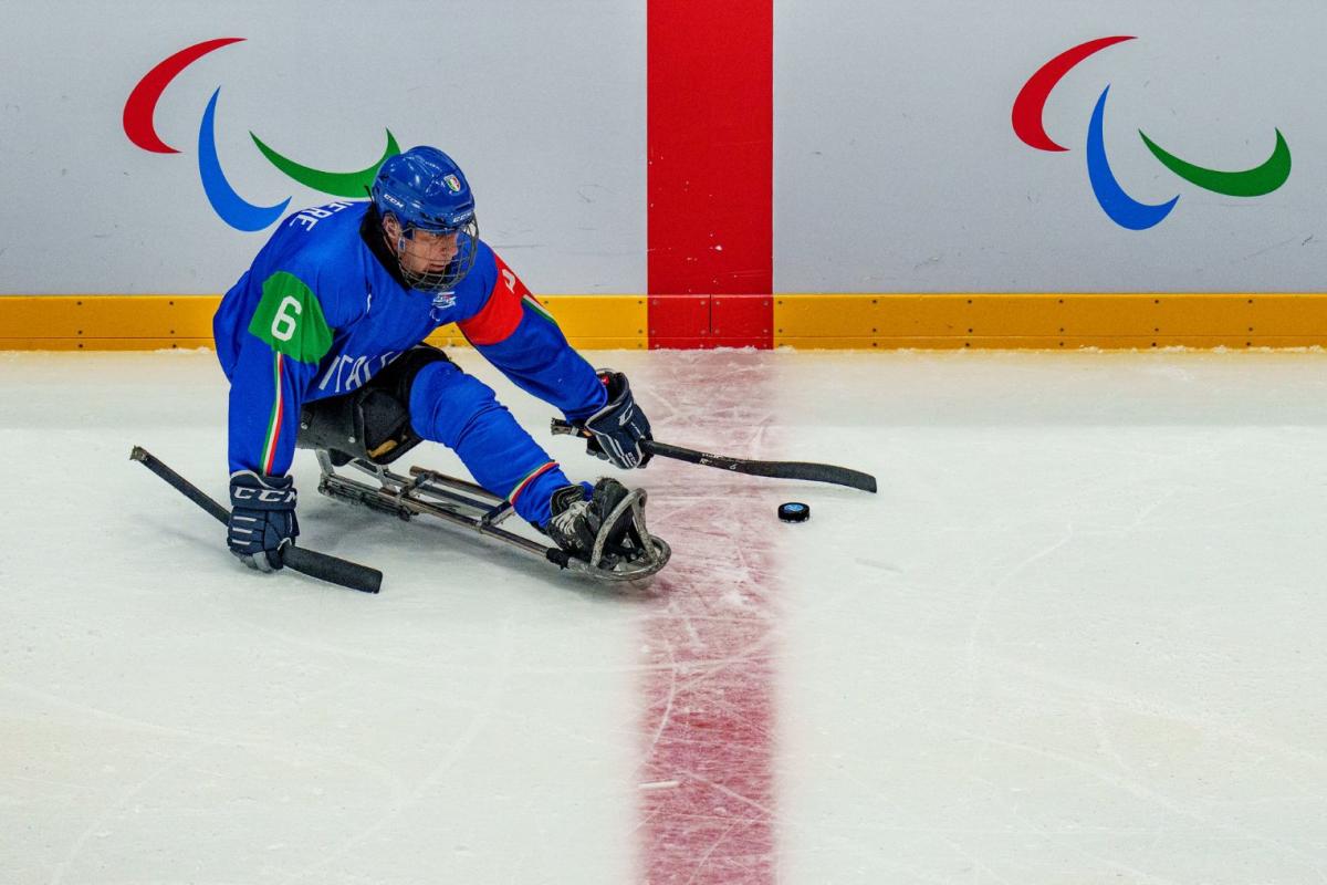 An Italian Para ice hockey player on the ice