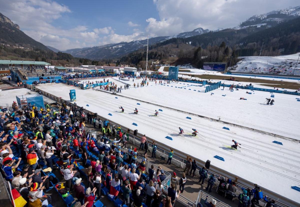 An image taken from the stands during a Para cross-country skiing competition at Milano Cortina 2026 Paralympics