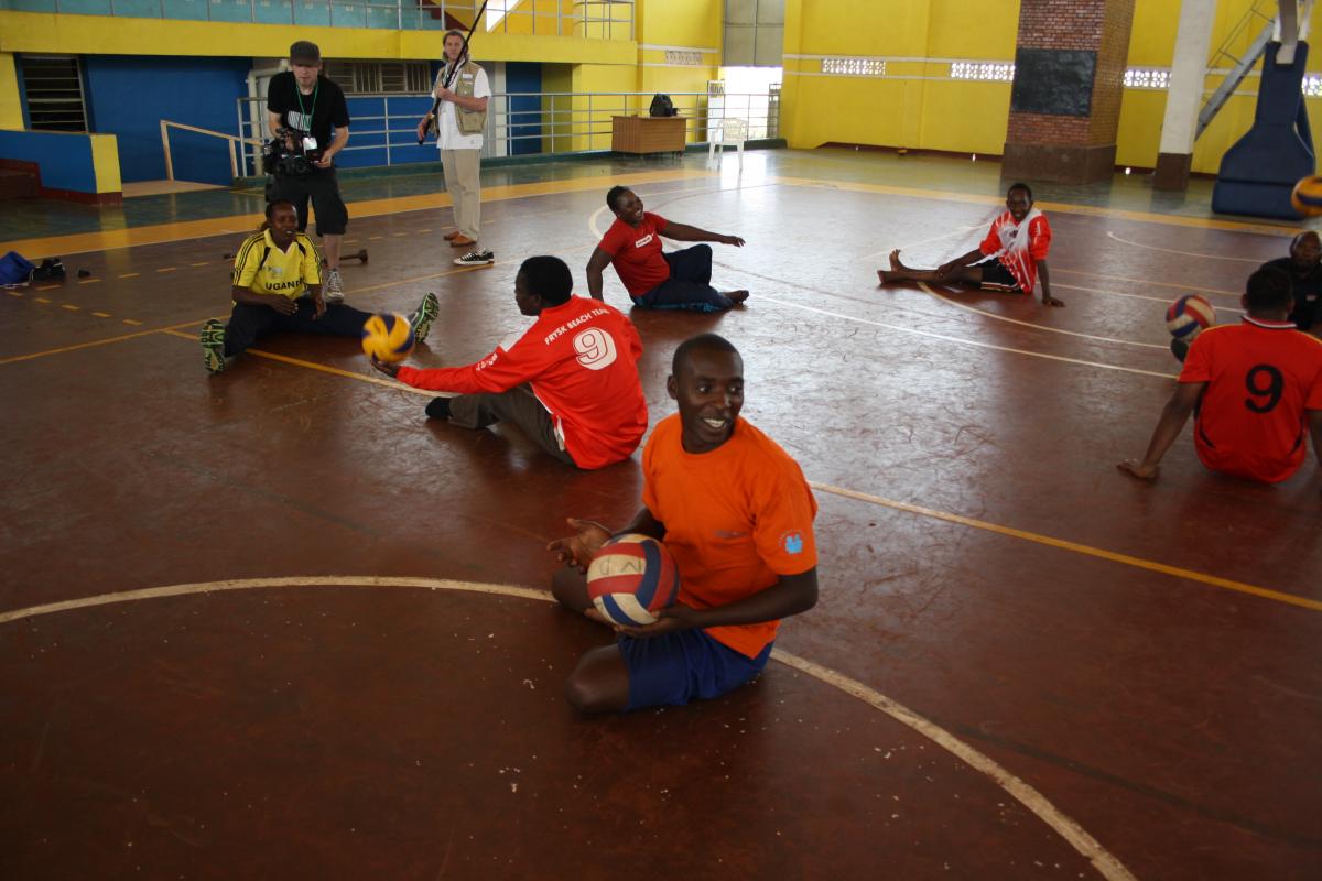 athletes practicing sitting volleyball