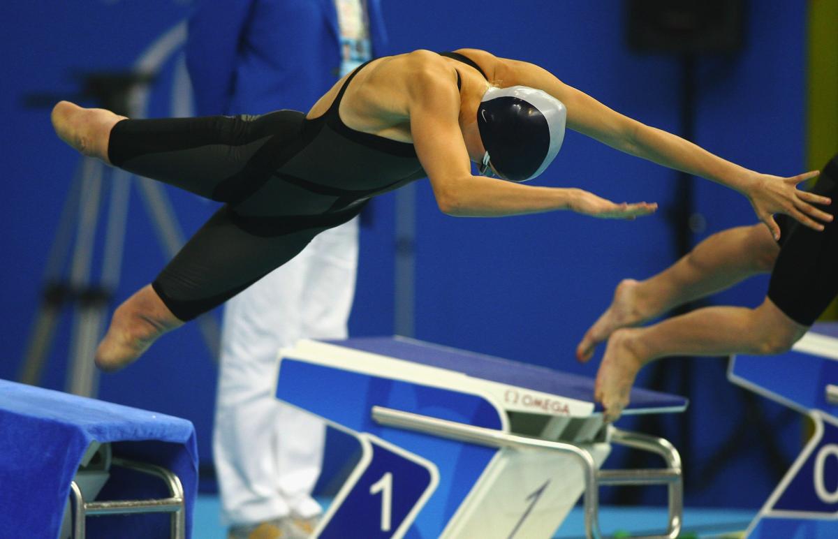 Jessica Long of the U.S.A competes in the Women's 50m Freestyle - S8 A picture of a girl jumping into a pool