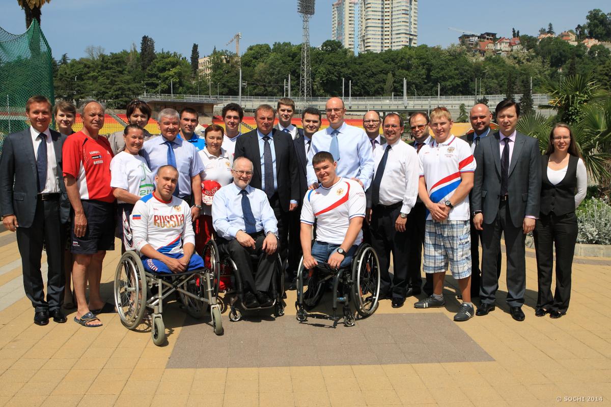 Sir Philip Craven visits Sochi A picture of several person posing for a group picture