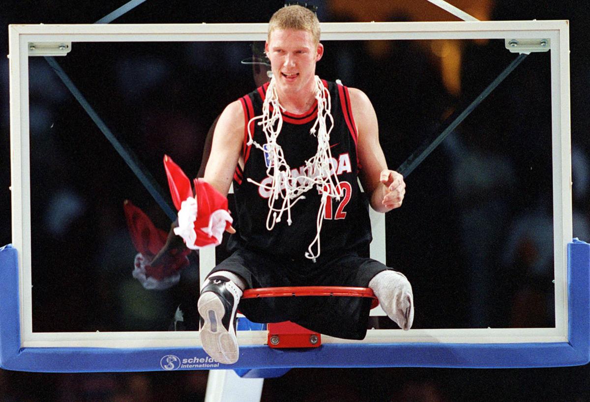 A picture of a man sit down on a basket