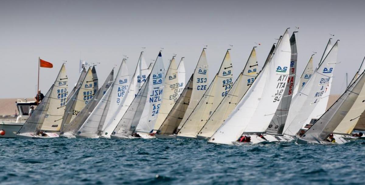 A group of 2.4mR boats lined up in a row