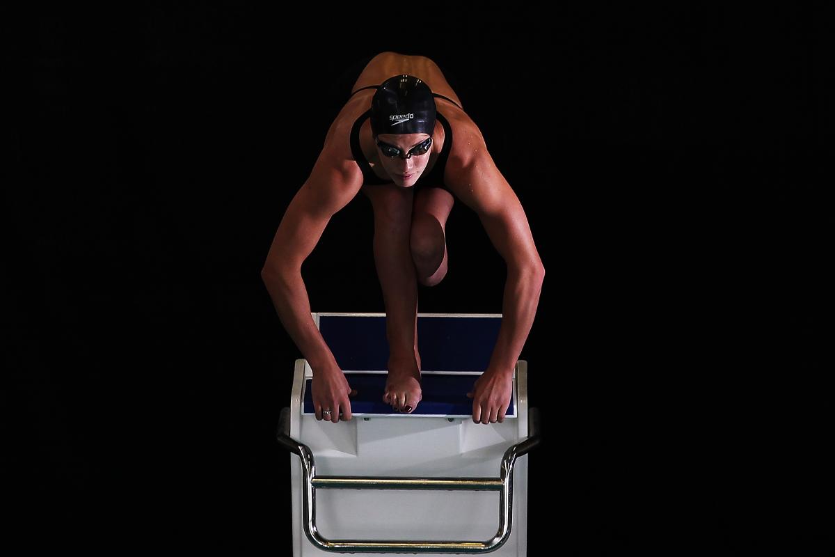 Sophie Pascoe A picture of a woman jumping in a pool