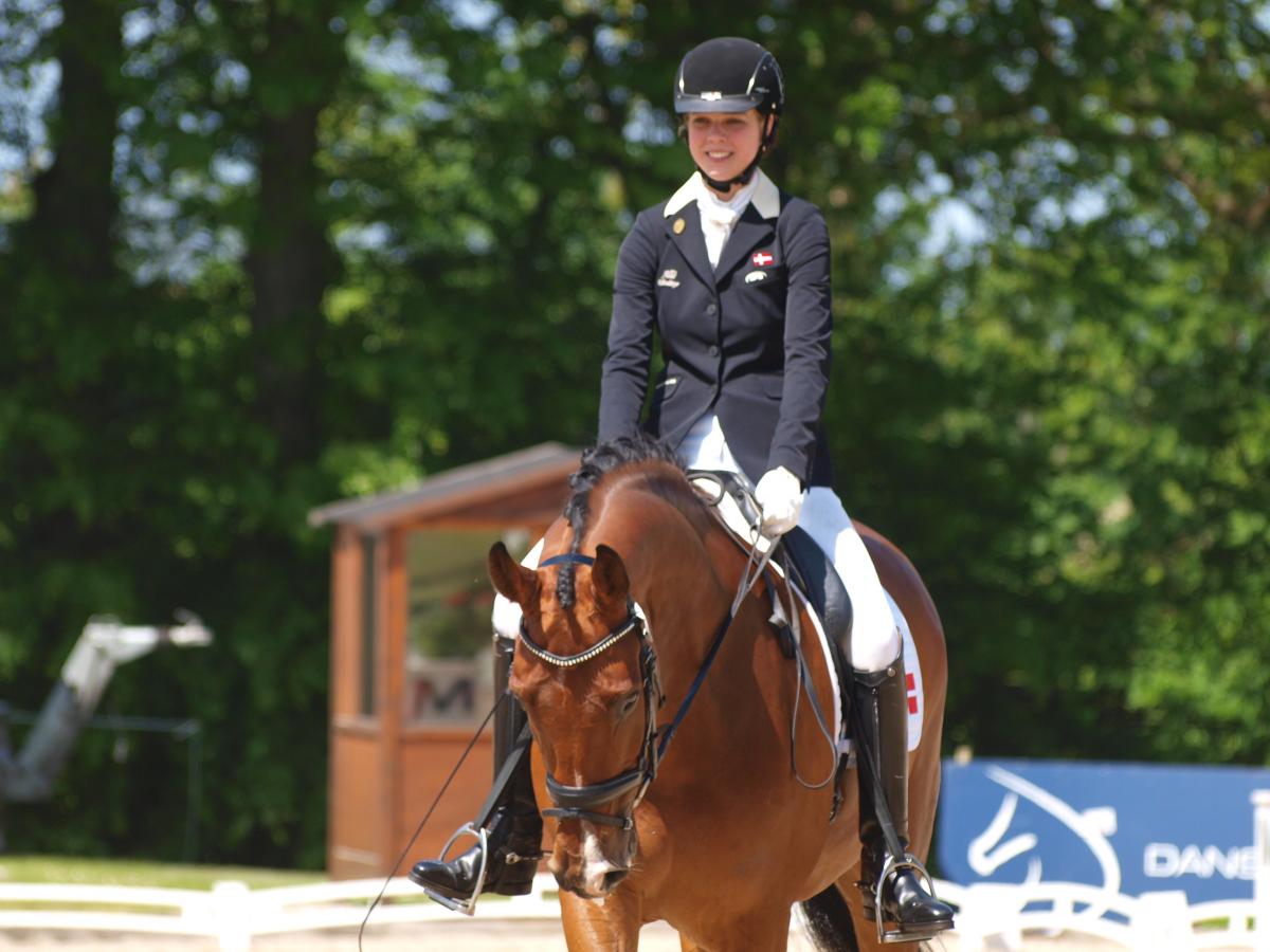 A picture of a woman riding