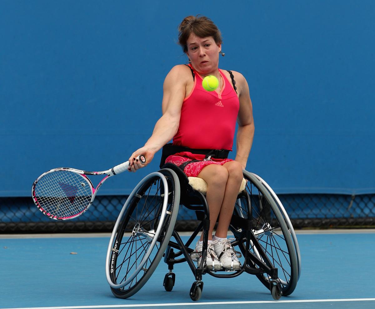 Annick Sevenans A picture of a woman in wheelchair playing tennis