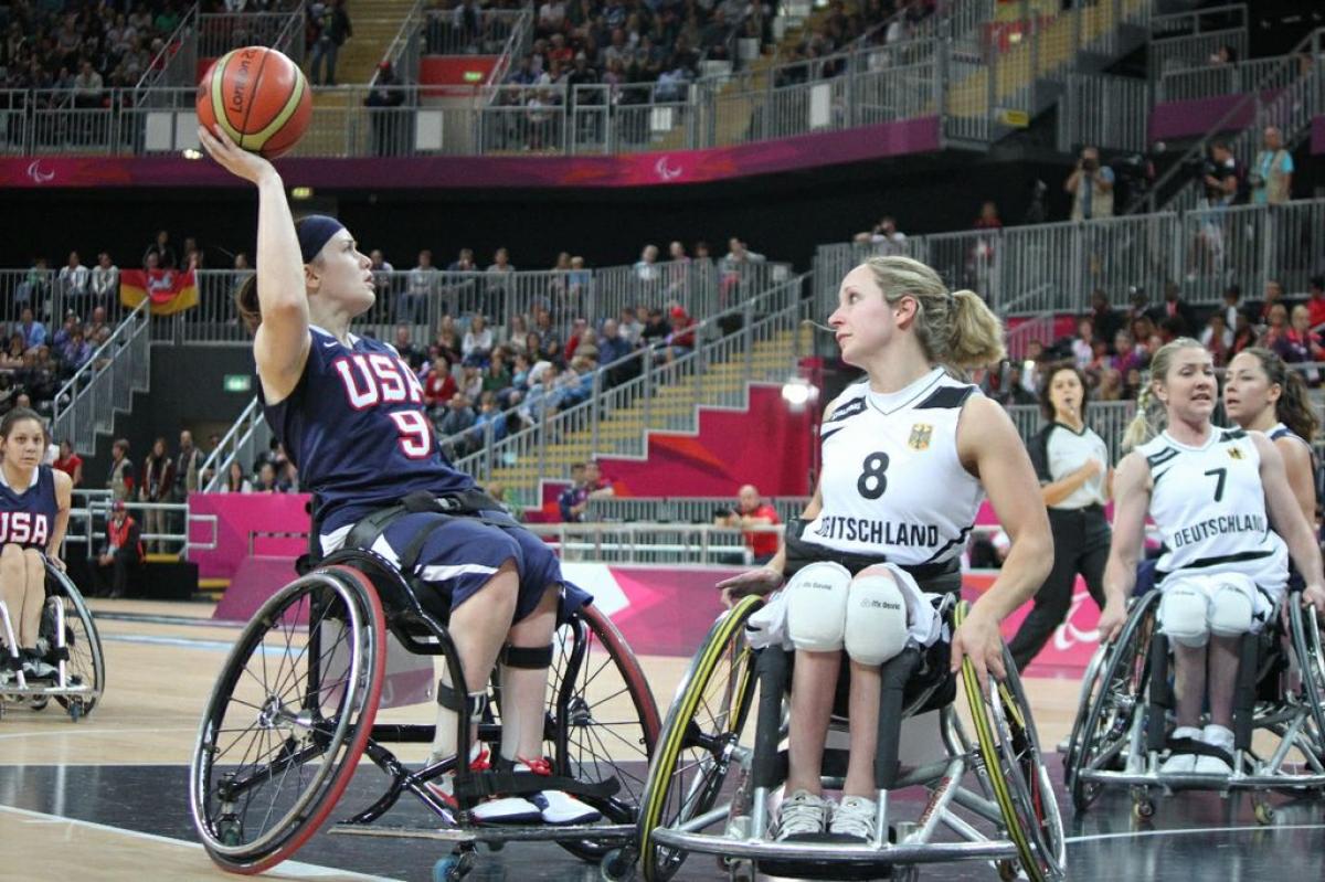 Desi Miller searches for options in the USA's match against Germany Desi Miller searches for options in the USA's match against Germany