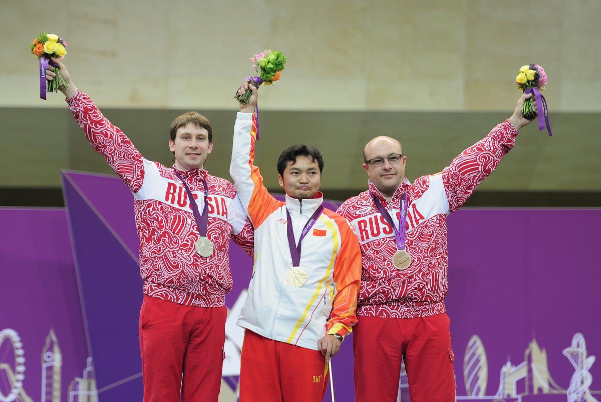 Li Jianfei wins shooting gold