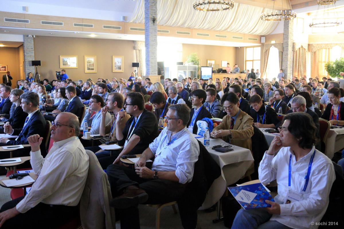 Sochi 2014 World Press Briefing A picture of room fill in by several attendees listening a conference
