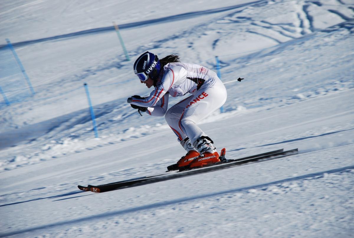 A picture of a woman skiing.