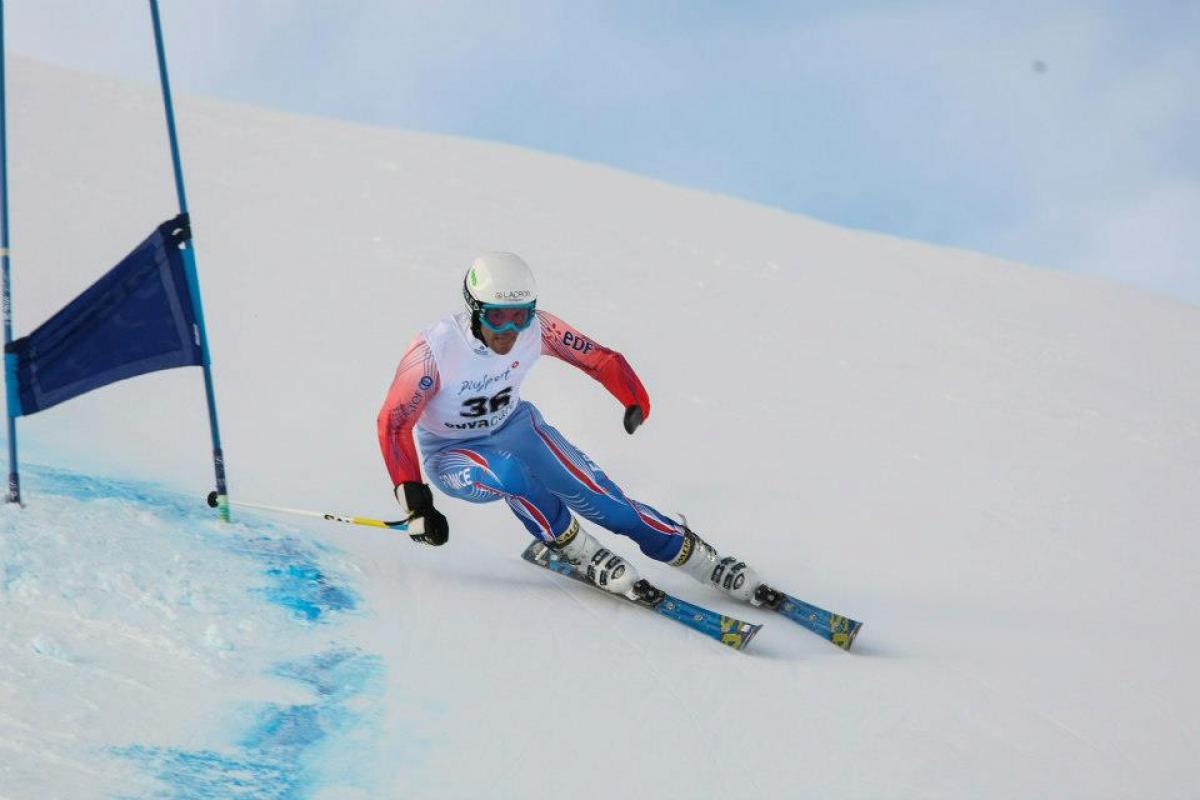 France's Vincent Gauthier-Manuel skiing slalom race at 2013 IPC Alpine Skiing World Cup in St Moritz, Switzerland