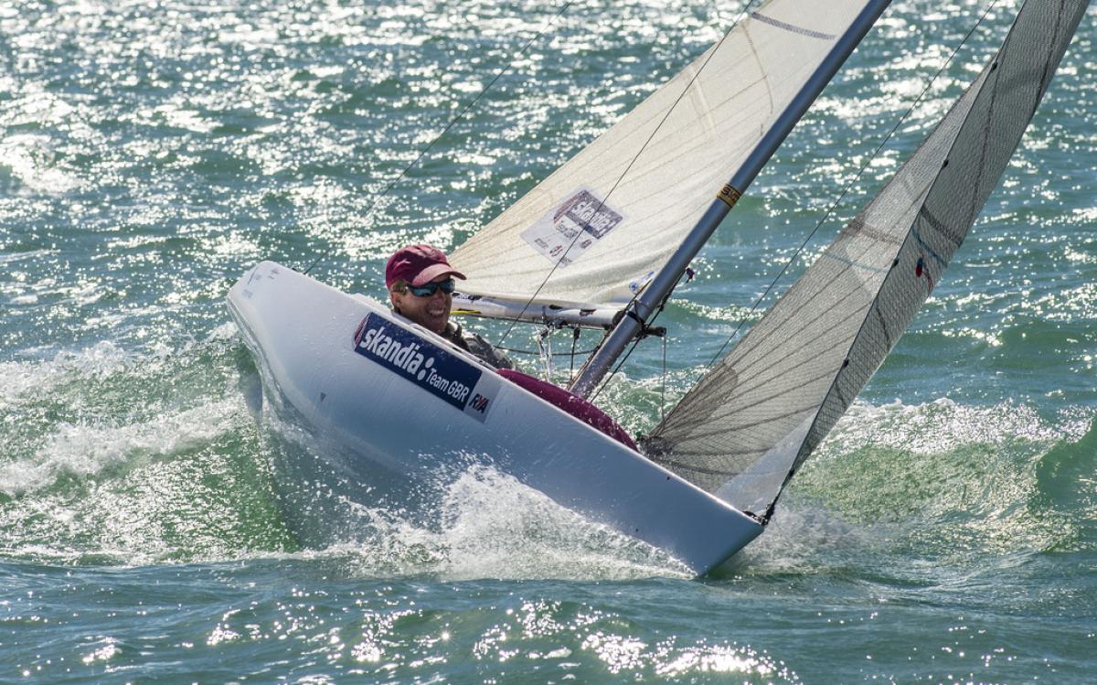 A picture of a woman in a small boat