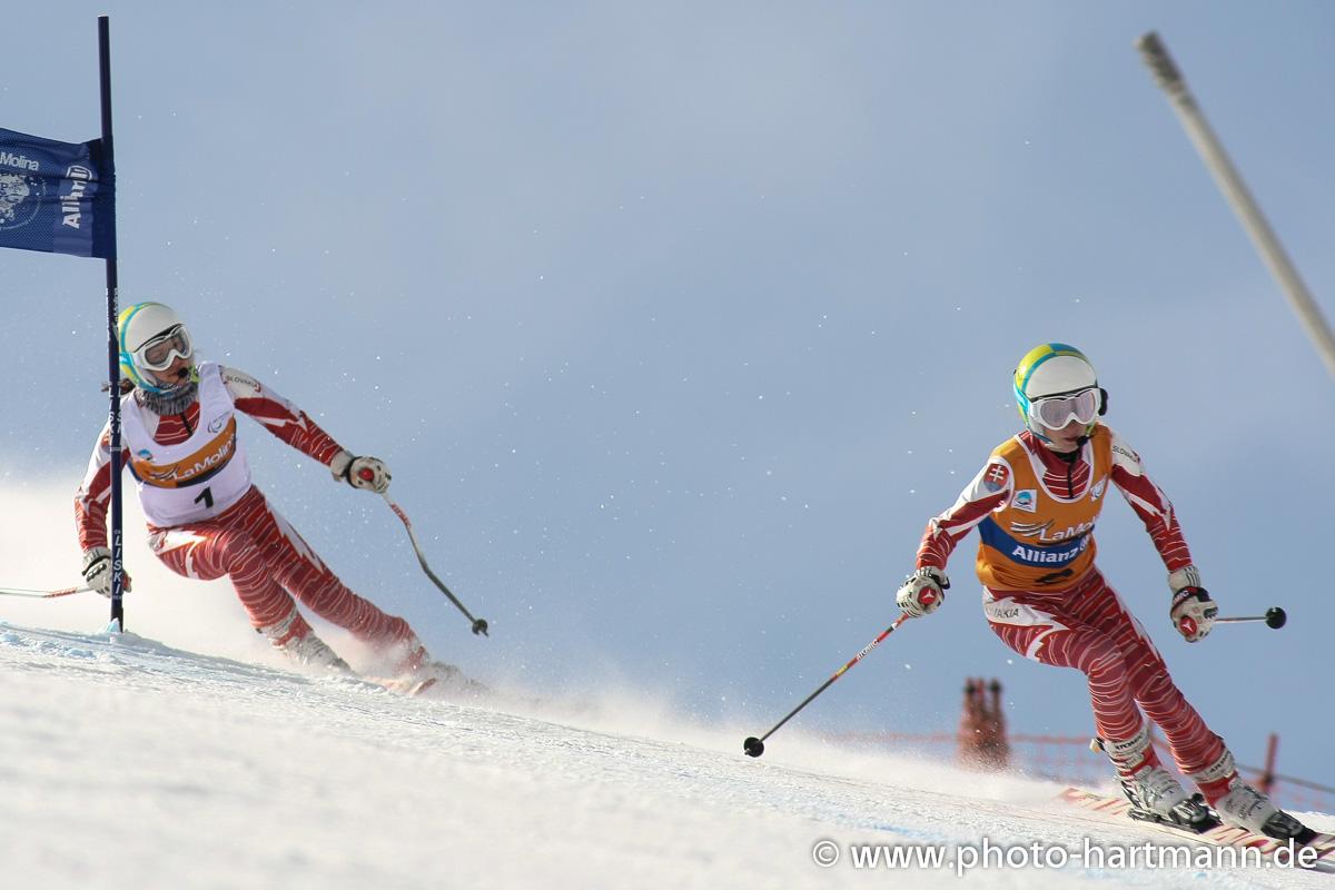 Henrieta Farkasova A picture of a woman skiing with her guide