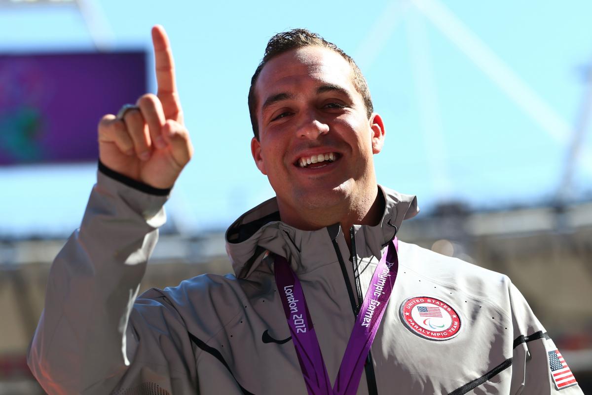 A picture of a man with a medal around his neck