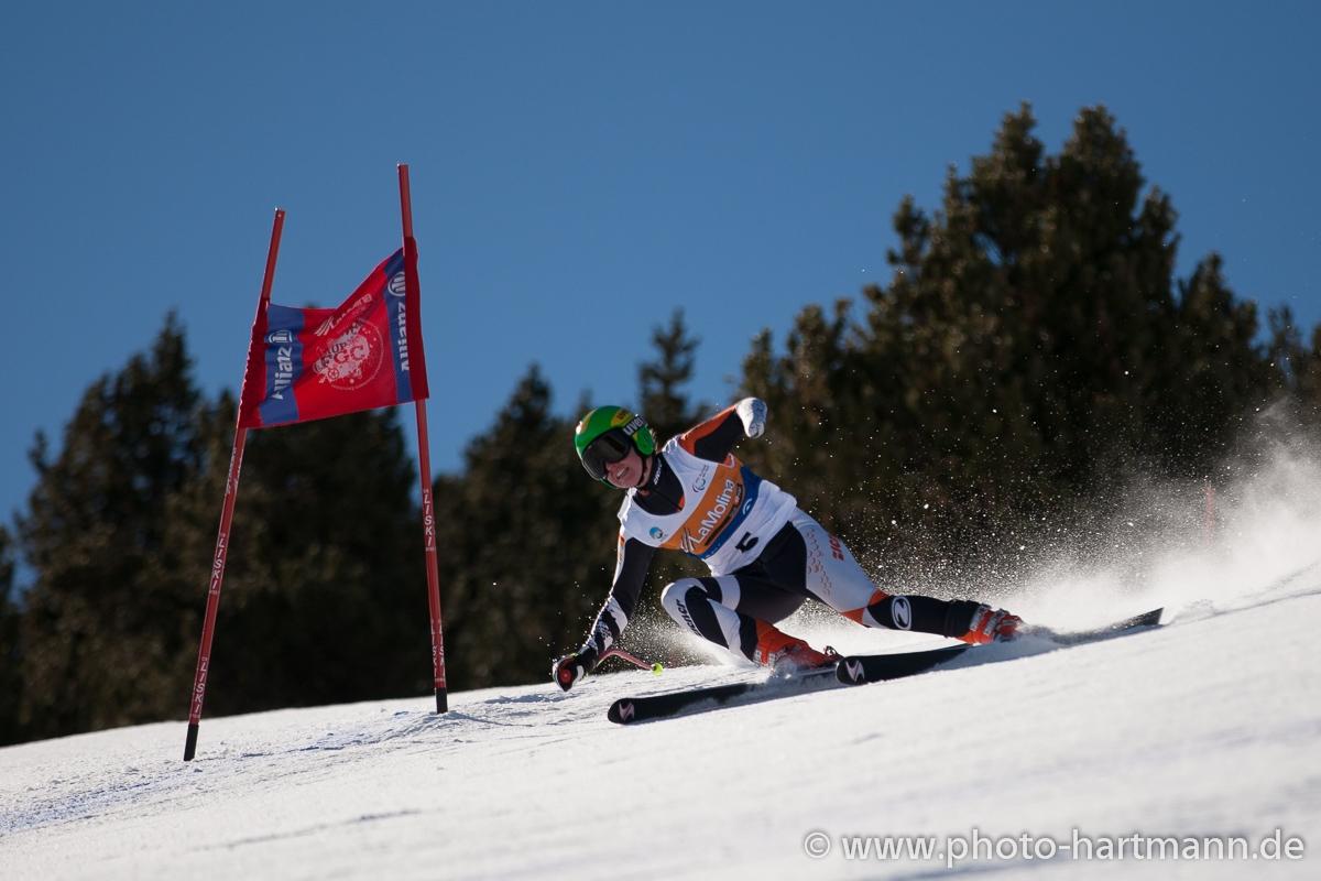 A picture of a woman skiing on the slopes