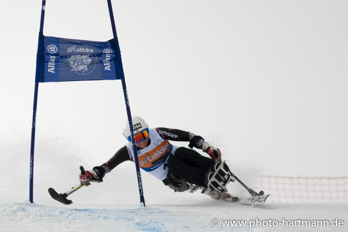 A picture of a woman skiing on the slopes