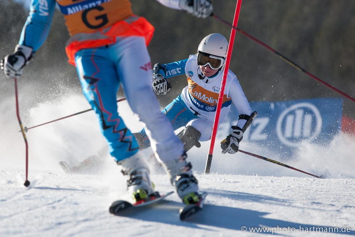 A picture of a woman skiing on the slopes