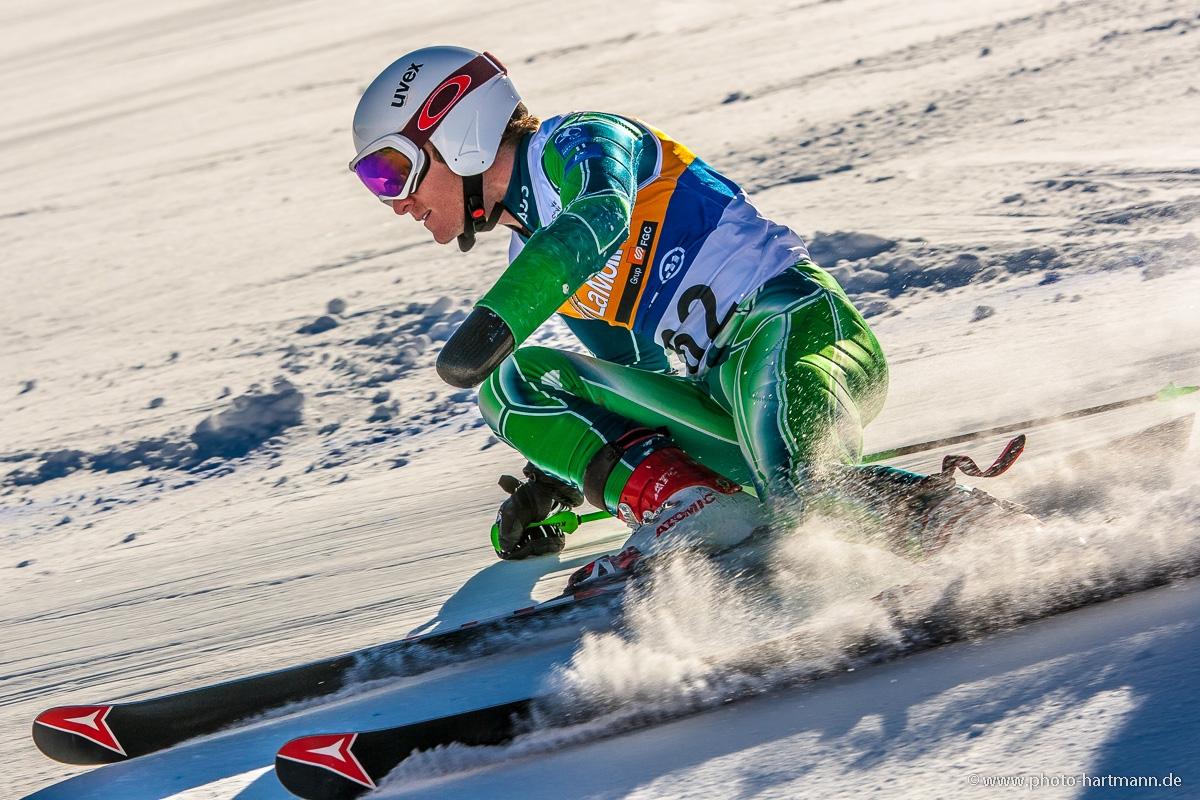 A picture of a man skiing on the slopes