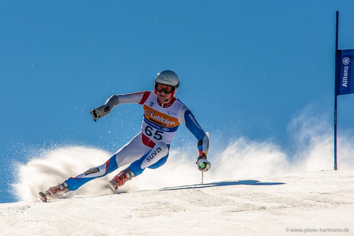 A picture of a man skiing on the slopes