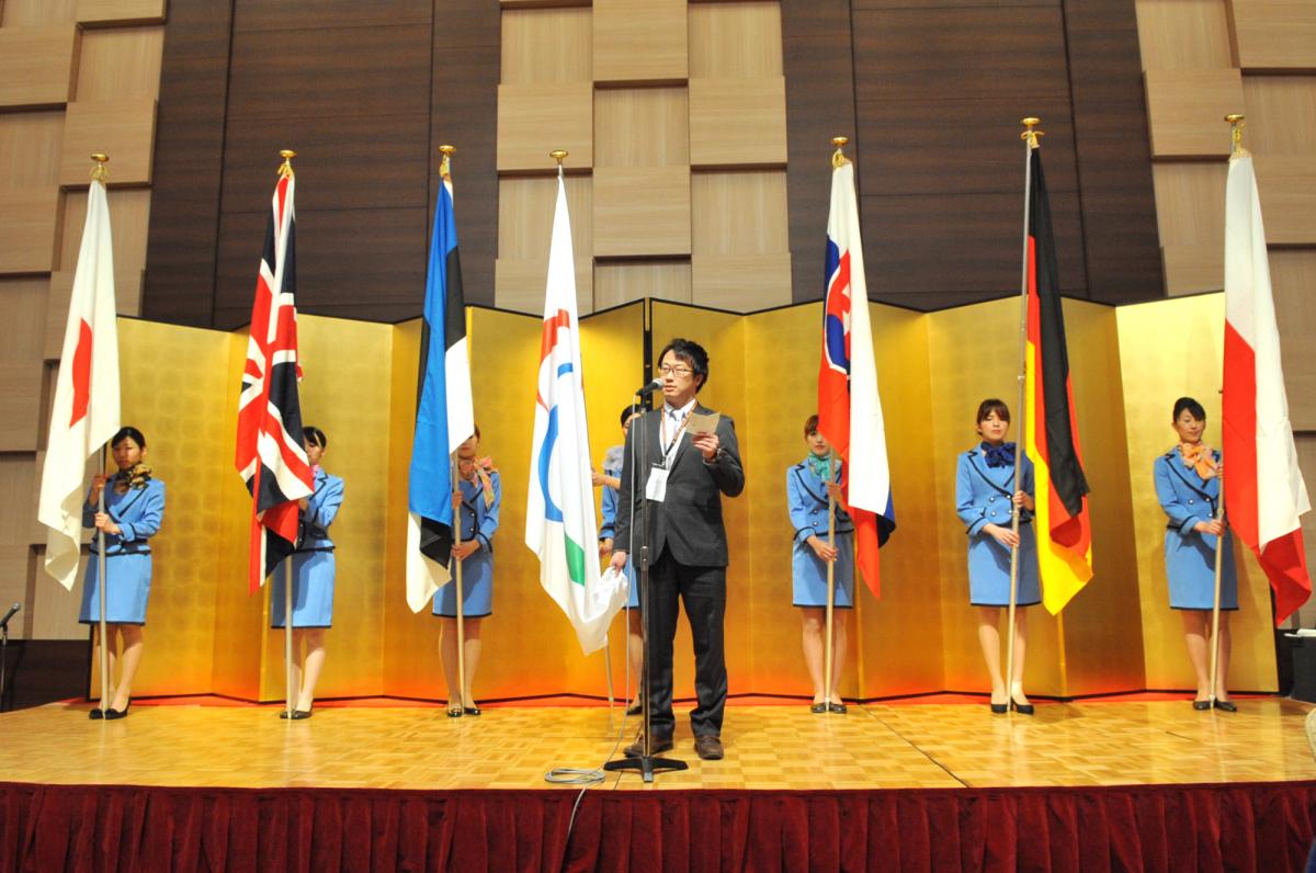 A picture of man talking during a speech