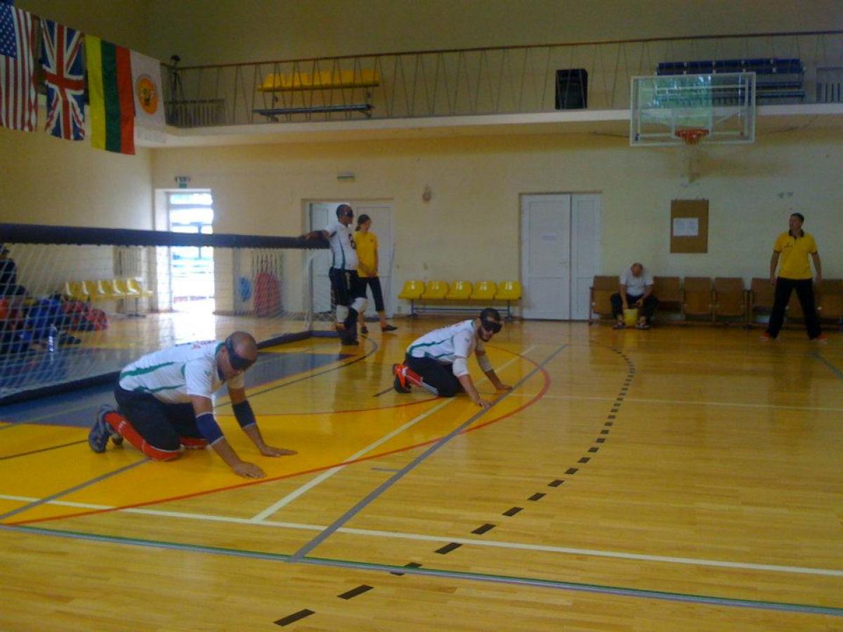 Two men playing goalball at the Algerian Goalball Championships 2013