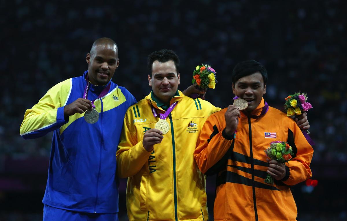 Athletics Shot Put F20 podium at London 2012 Paralympics The winners of the Men's Shot Put F20 Final at the London 2012 Paralympic Games show their medals