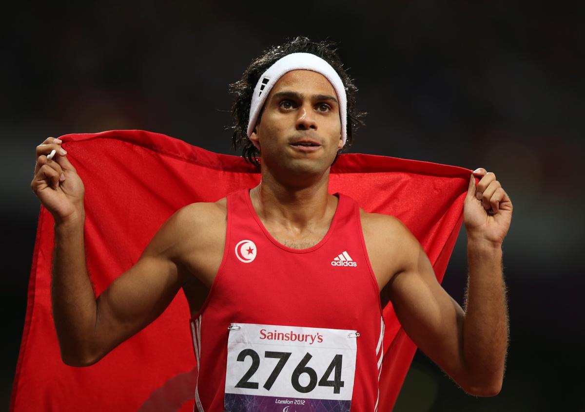 Mohamed Farhat Chida of Tunisia wins gold in the Men's 400m - T38 Final at the London 2012 Paralympic Games 