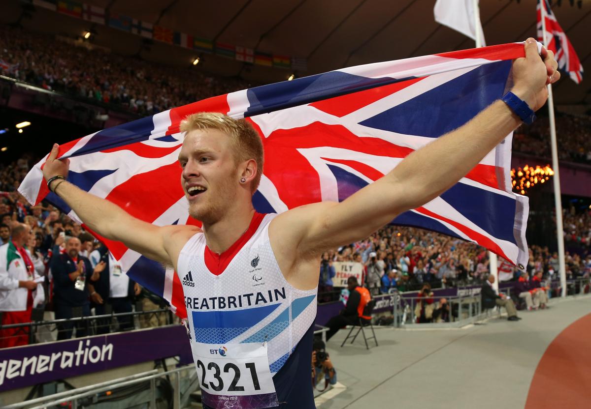 Jonnie Peacock celebrates winning gold in the men's 100m T44 Final on Day 8 of the London 2012 Paralympic Games.