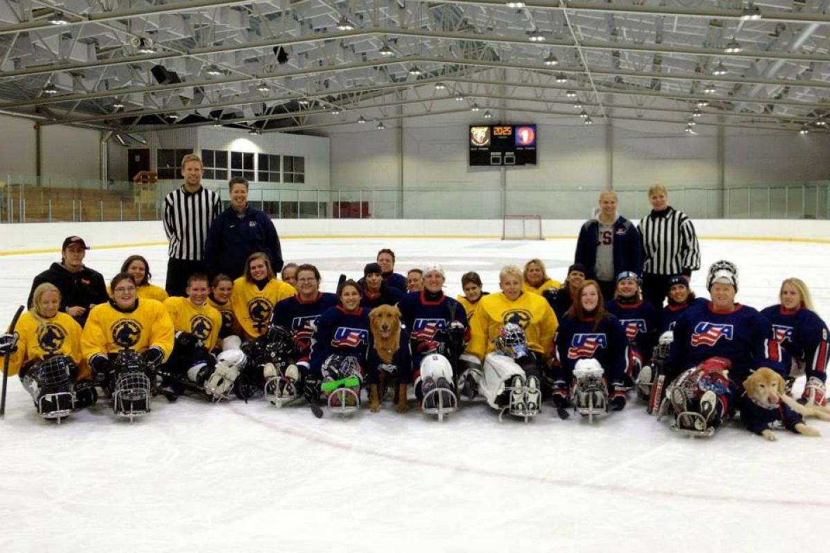 USA and Europe's women's ice sledge hockey teams