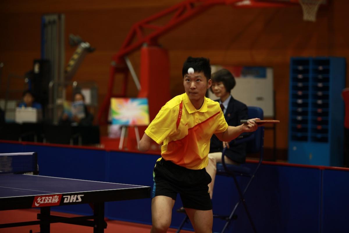 Chinese player Ge Yang takes a shot