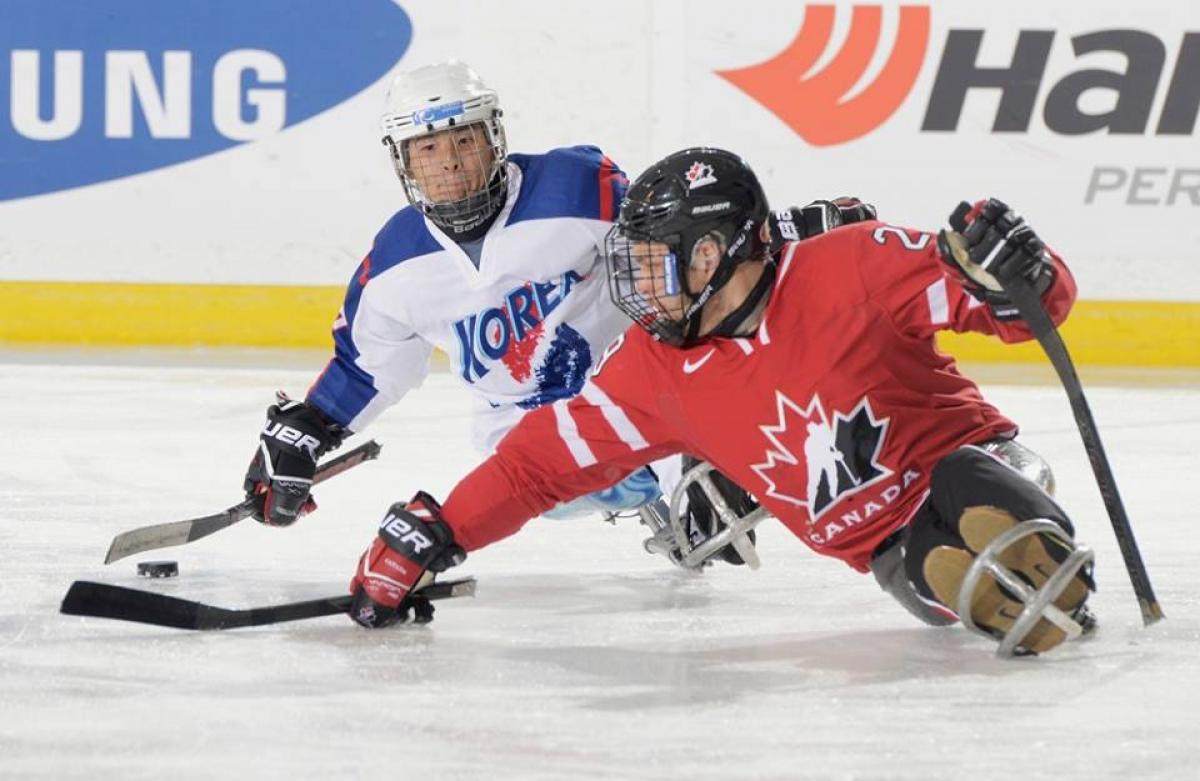 Canada and South Korea's ice sledge hockey teams