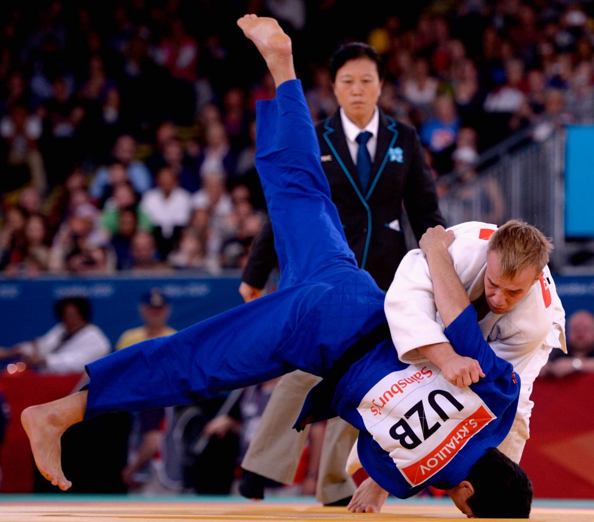 Dmytro Solovey of Ukraine and Sharif Khalilov of Uzbekistan compete in the Men's 73kg Gold Medal Contest at the London 2012 Paralympic Games