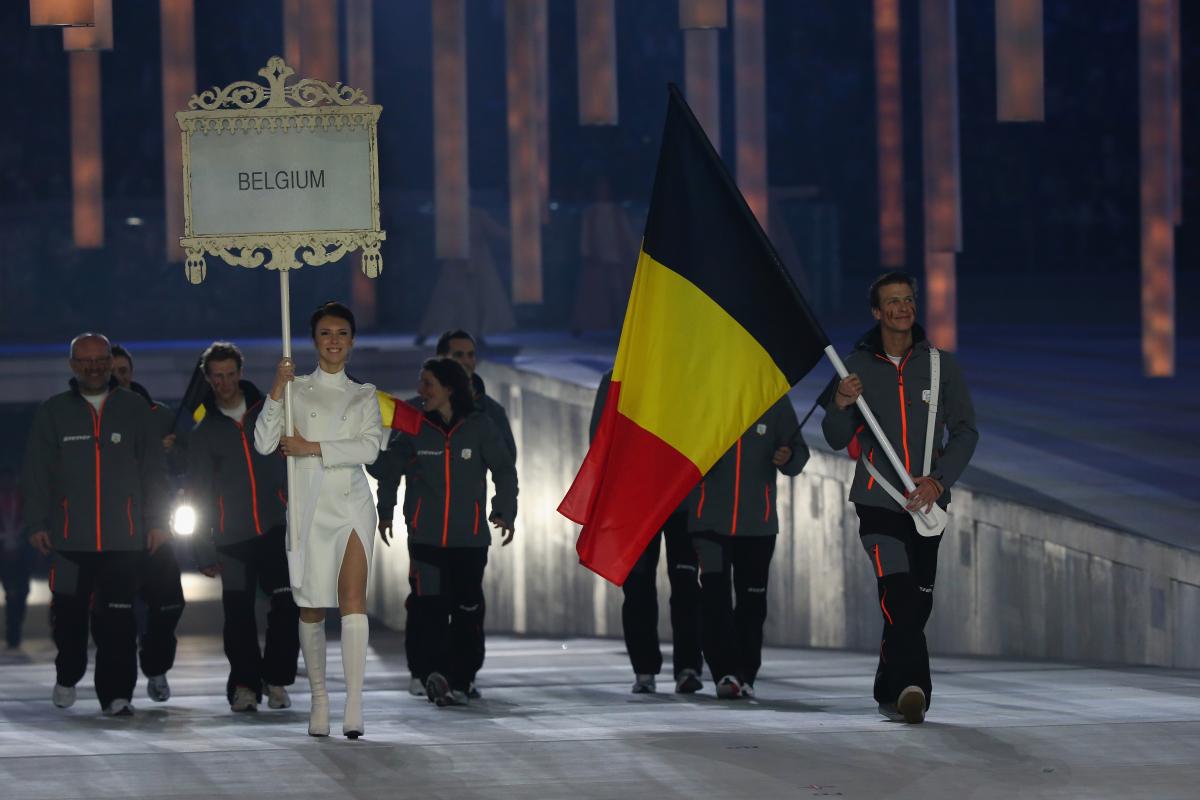 Belgium enter the arena lead by flag bearer Denis Colle during the Opening Ceremony of the Sochi 2014 Paralympic Winter Games Belgium enter the arena lead by flag bearer Denis Colle during the Opening Ceremony of the Sochi 2014 Paralympic Winter Games