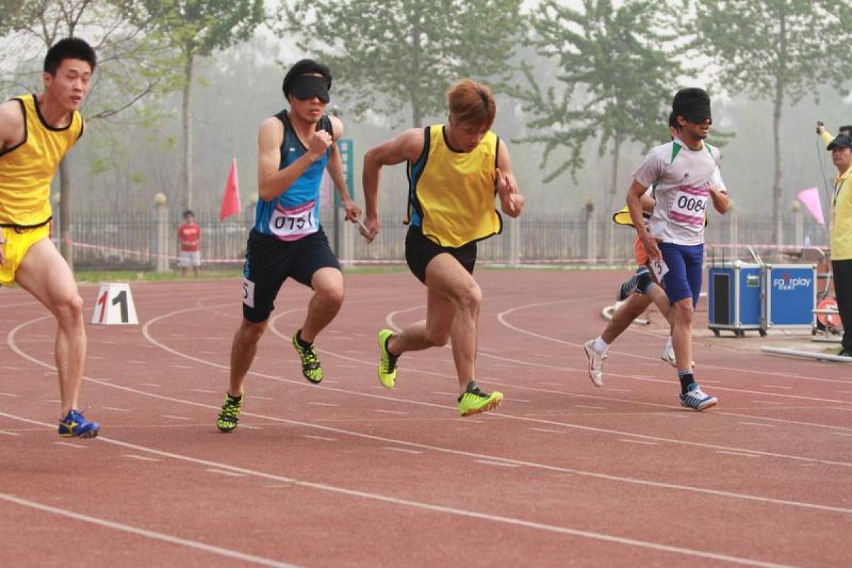Beijing Grand Prix Athletes with a visual impairment compete in the 100m at the 2014 IPC Athletics Grand Prix in Beijing.